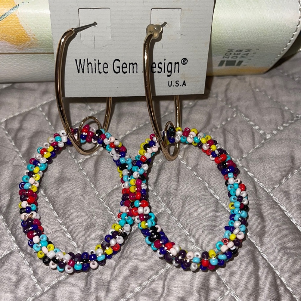 Multicolor and gold drop down hoop earrings.